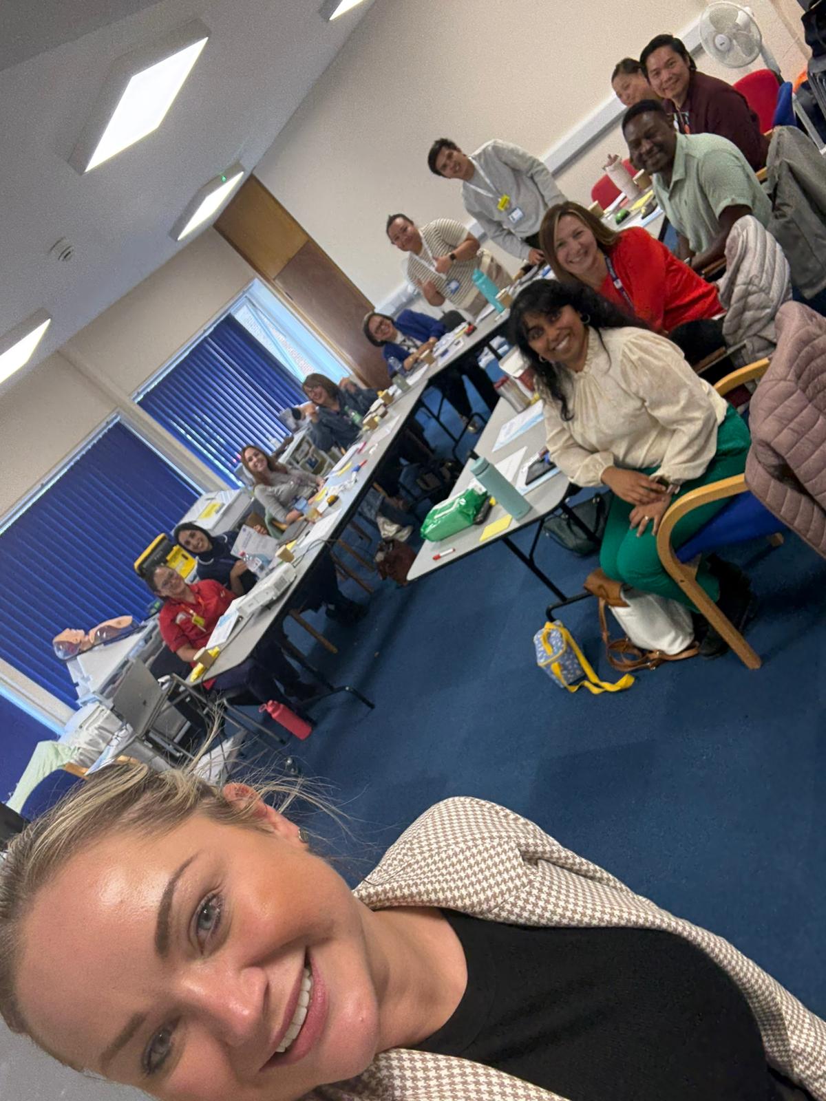Training room selfie with the cohort